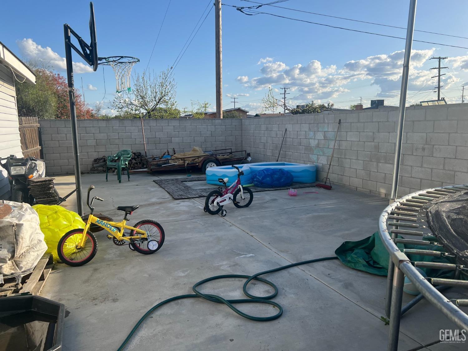 Undisclosed Address Delano, CA 93215 - Photo 15 of 17 a view of a chairs and table in patio
