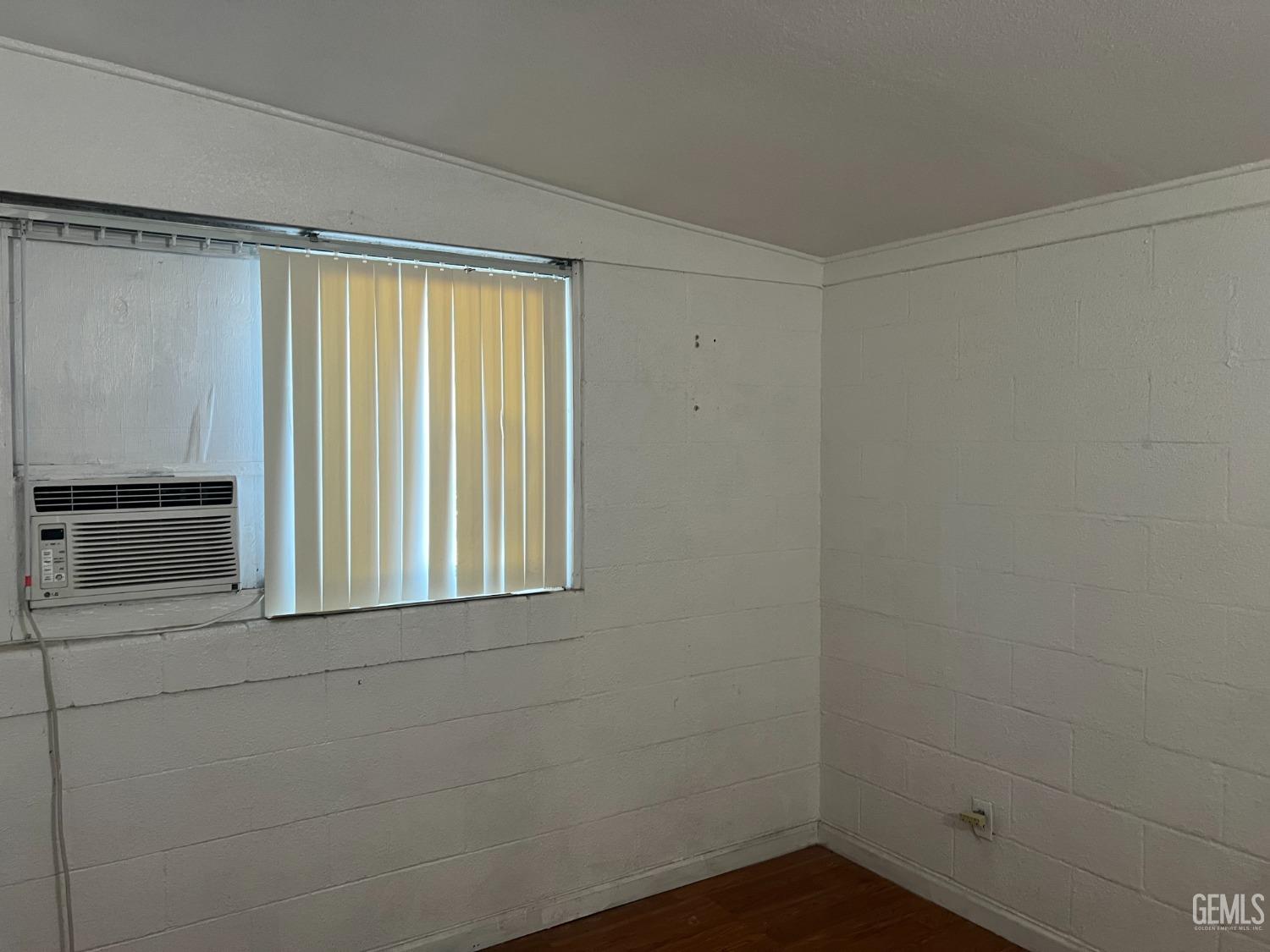 Undisclosed Address Delano, CA 93215 - Photo 10 of 17 a view of an empty room with a window