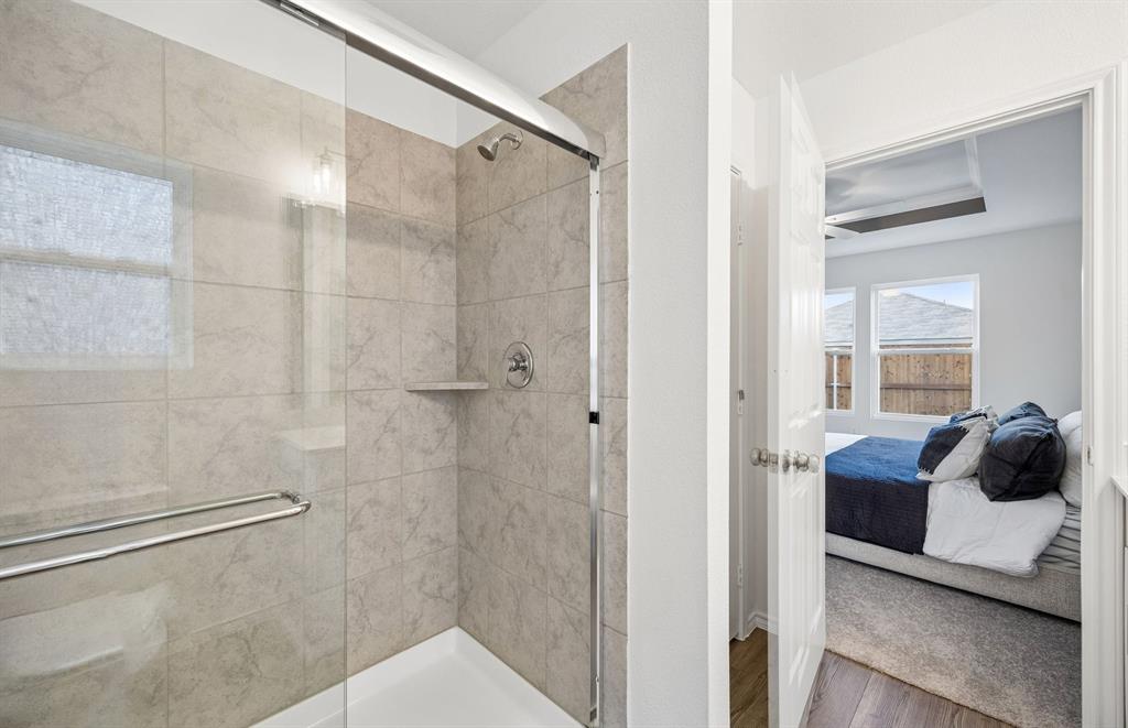 14123 Nullah Street Pilot Point, TX 76258 - Photo 10 of 21 *Model representation Owners bath with sliding glass shower