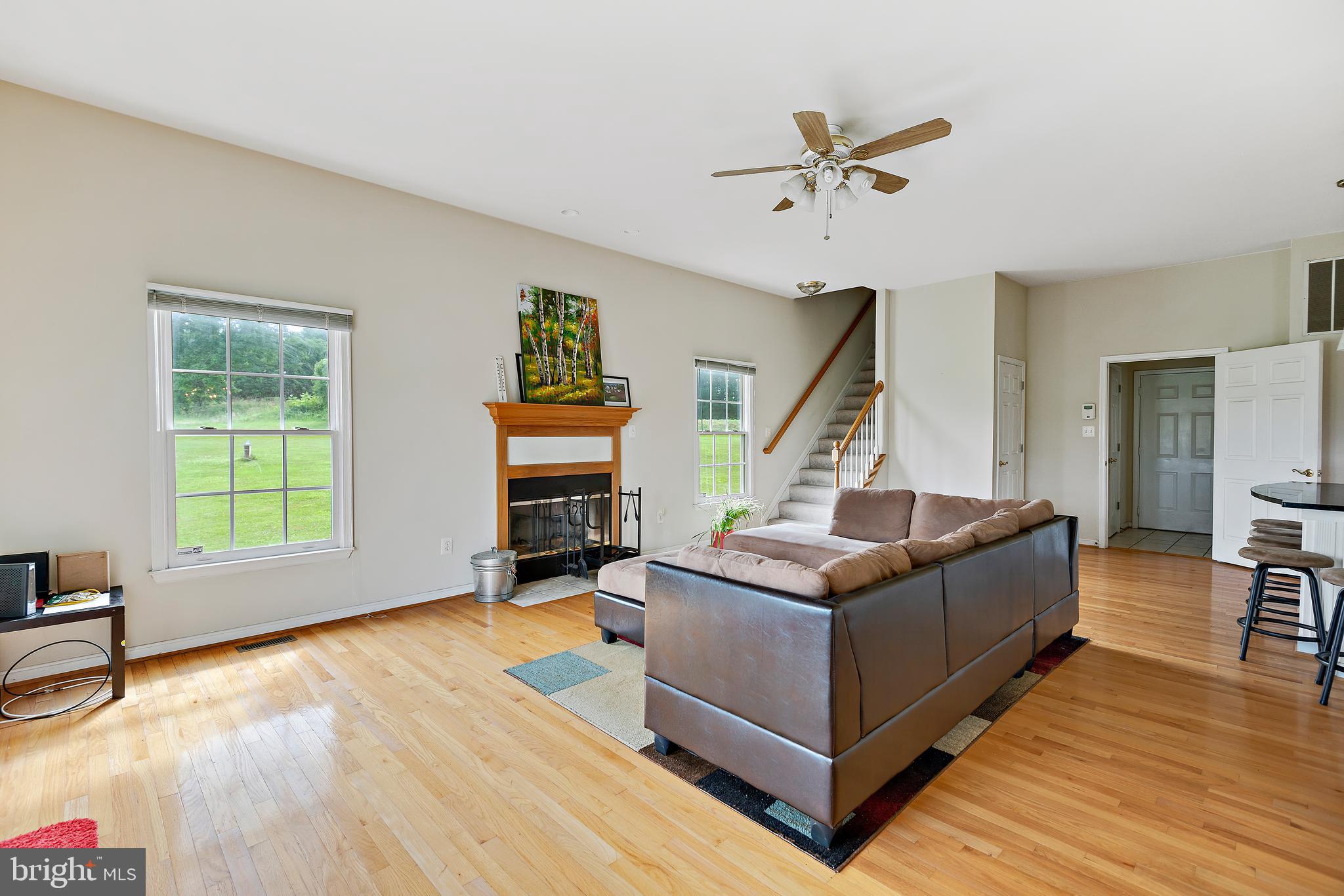 3356 Park Mills Road Frederick, MD 21704 - Photo 20 of 80 a living room with furniture and a wooden floor