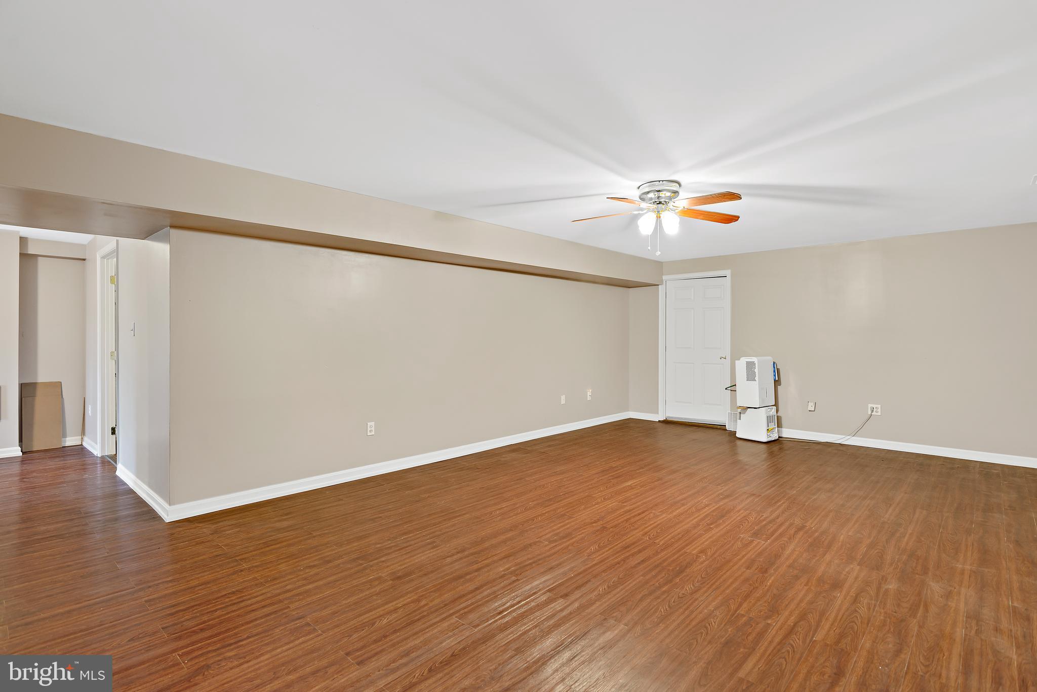 3356 Park Mills Road Frederick, MD 21704 - Photo 65 of 80 a view of an empty room with wooden floor