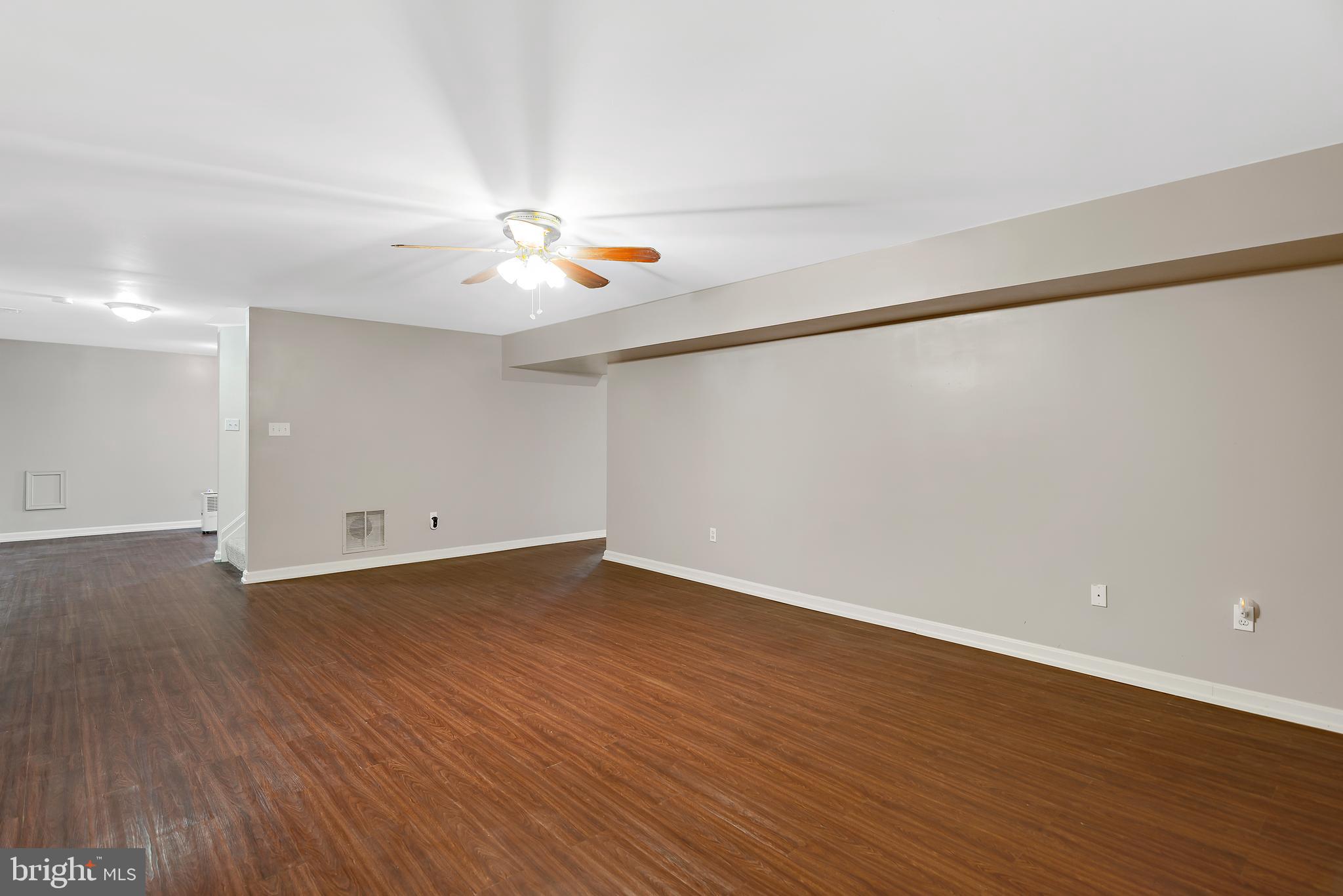 3356 Park Mills Road Frederick, MD 21704 - Photo 66 of 80 a view of an empty room with wooden floor