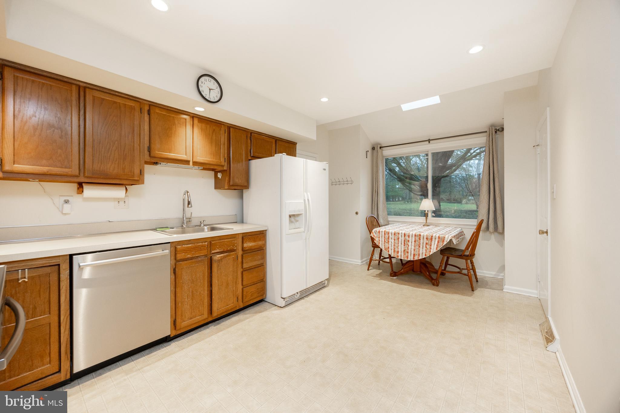 103 Stephen Drive Downingtown, PA 19335 - Photo 11 of 52 a kitchen with sink cabinets and window