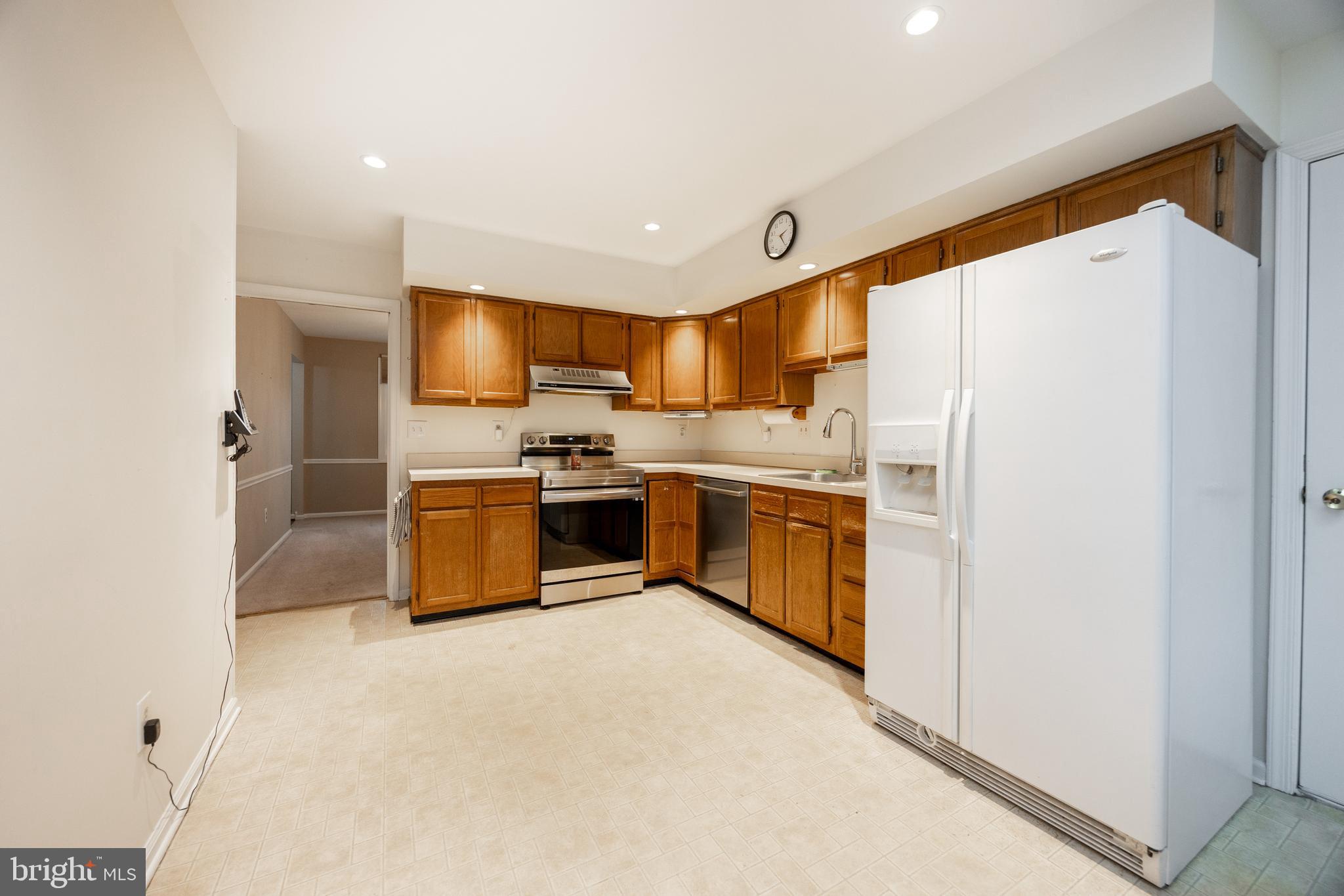 103 Stephen Drive Downingtown, PA 19335 - Photo 13 of 52 a kitchen with stainless steel appliances a refrigerator sink and microwave