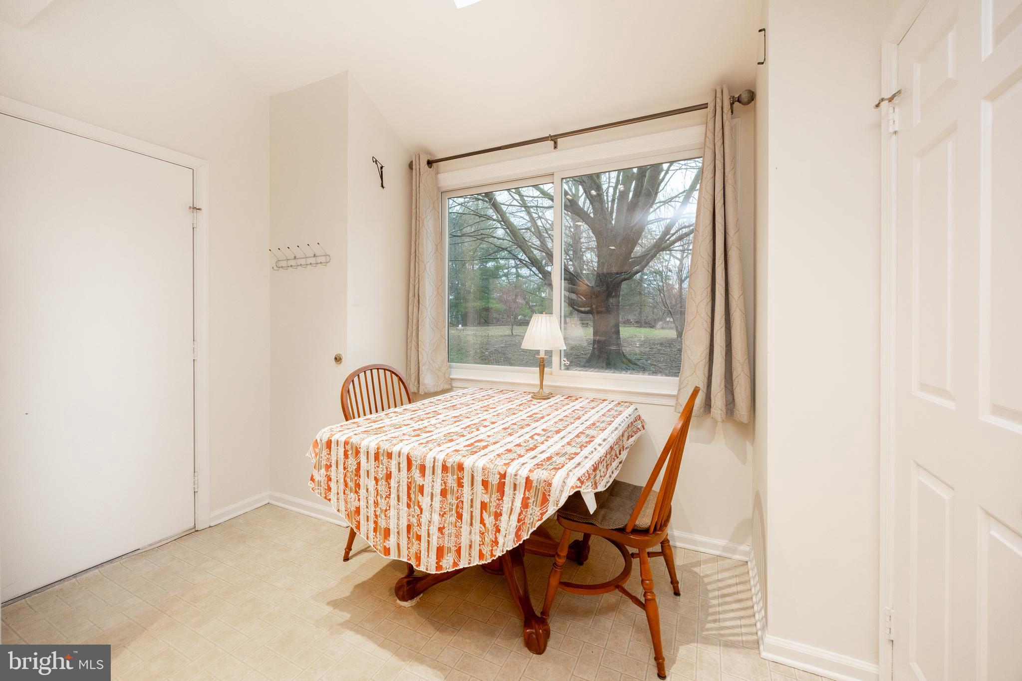 103 Stephen Drive Downingtown, PA 19335 - Photo 14 of 52 a bedroom with a bed and a table