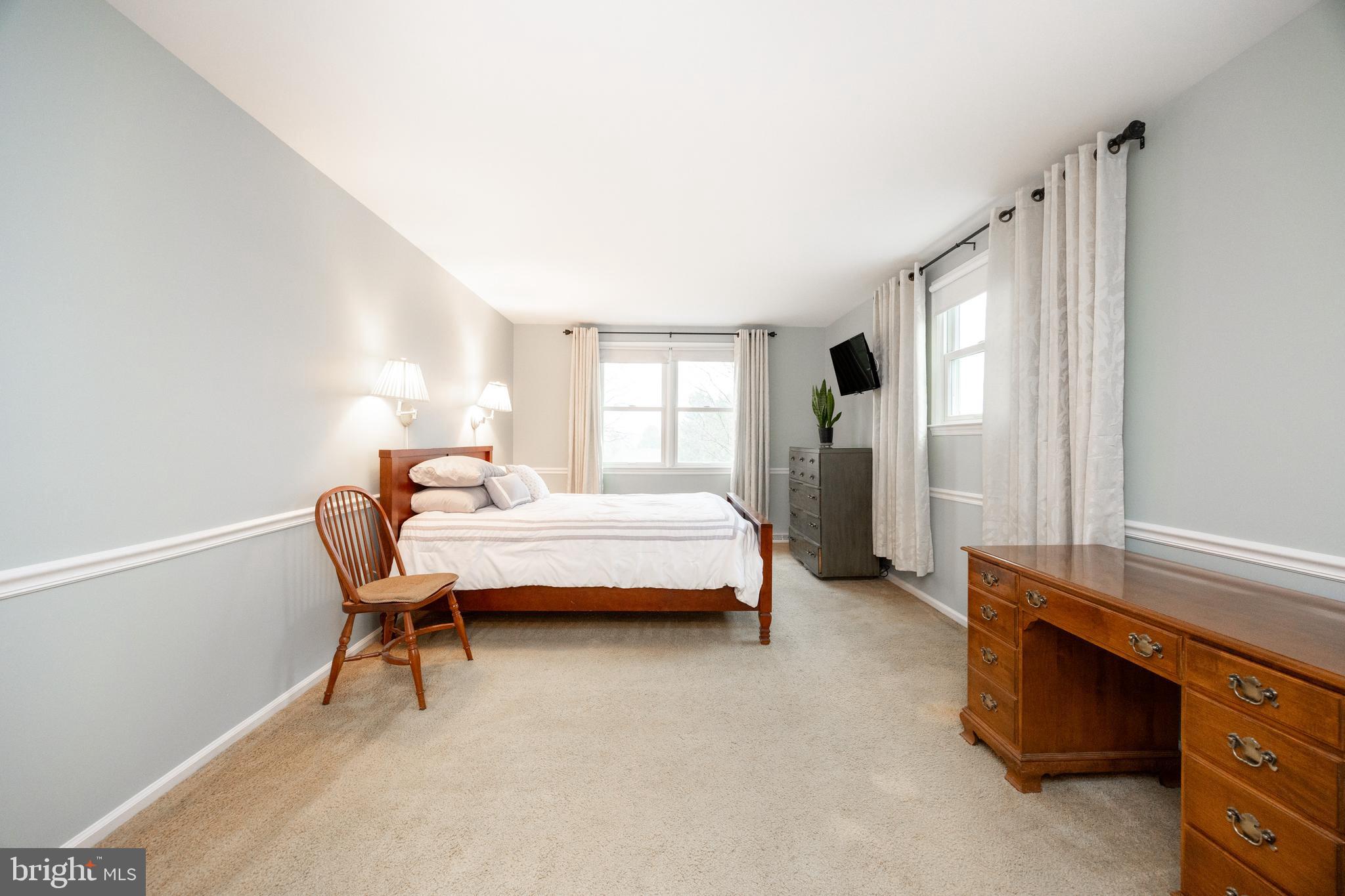 103 Stephen Drive Downingtown, PA 19335 - Photo 16 of 52 a bedroom with a bed and a window