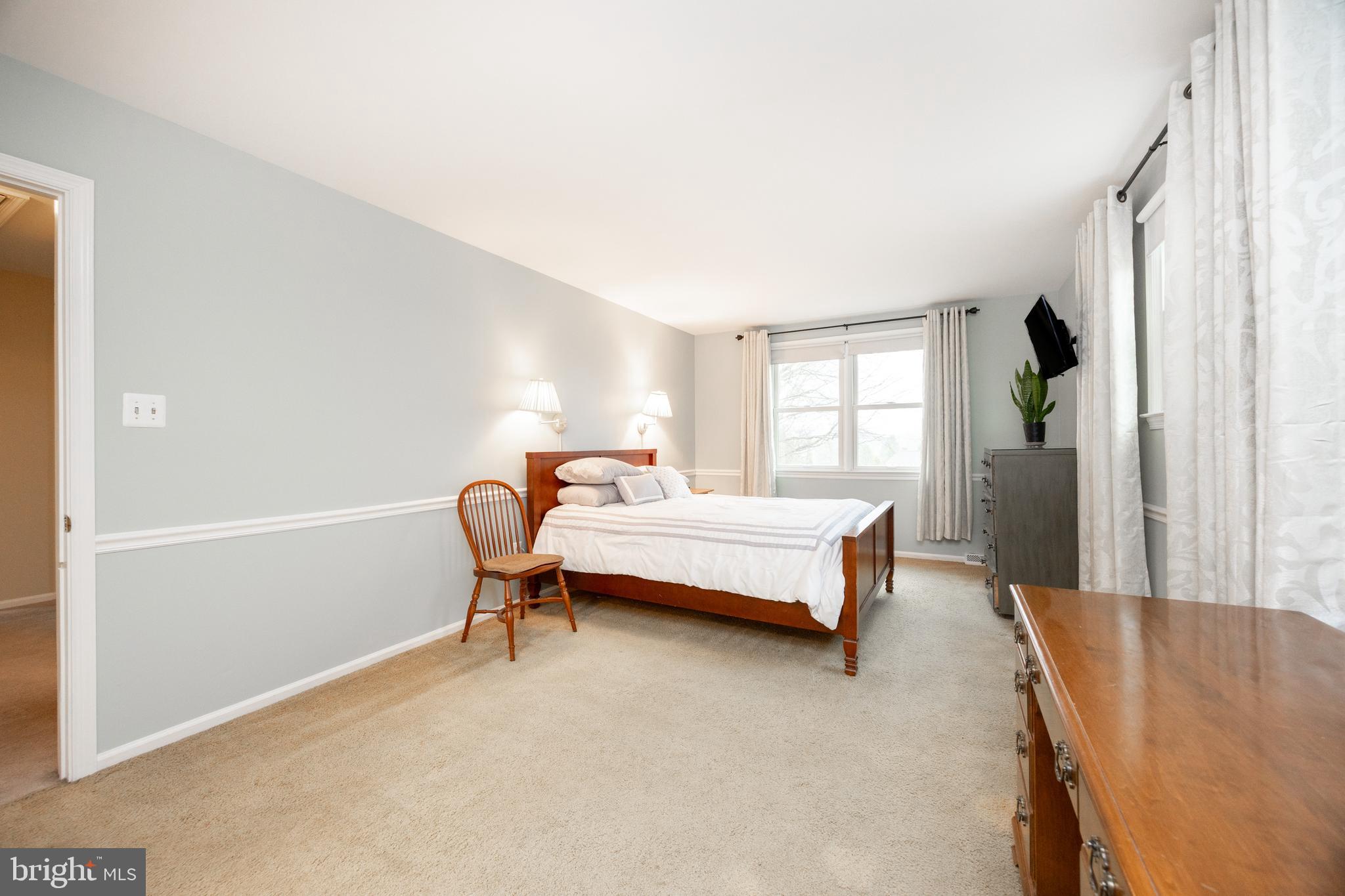103 Stephen Drive Downingtown, PA 19335 - Photo 17 of 52 a bedroom with a bed and a window