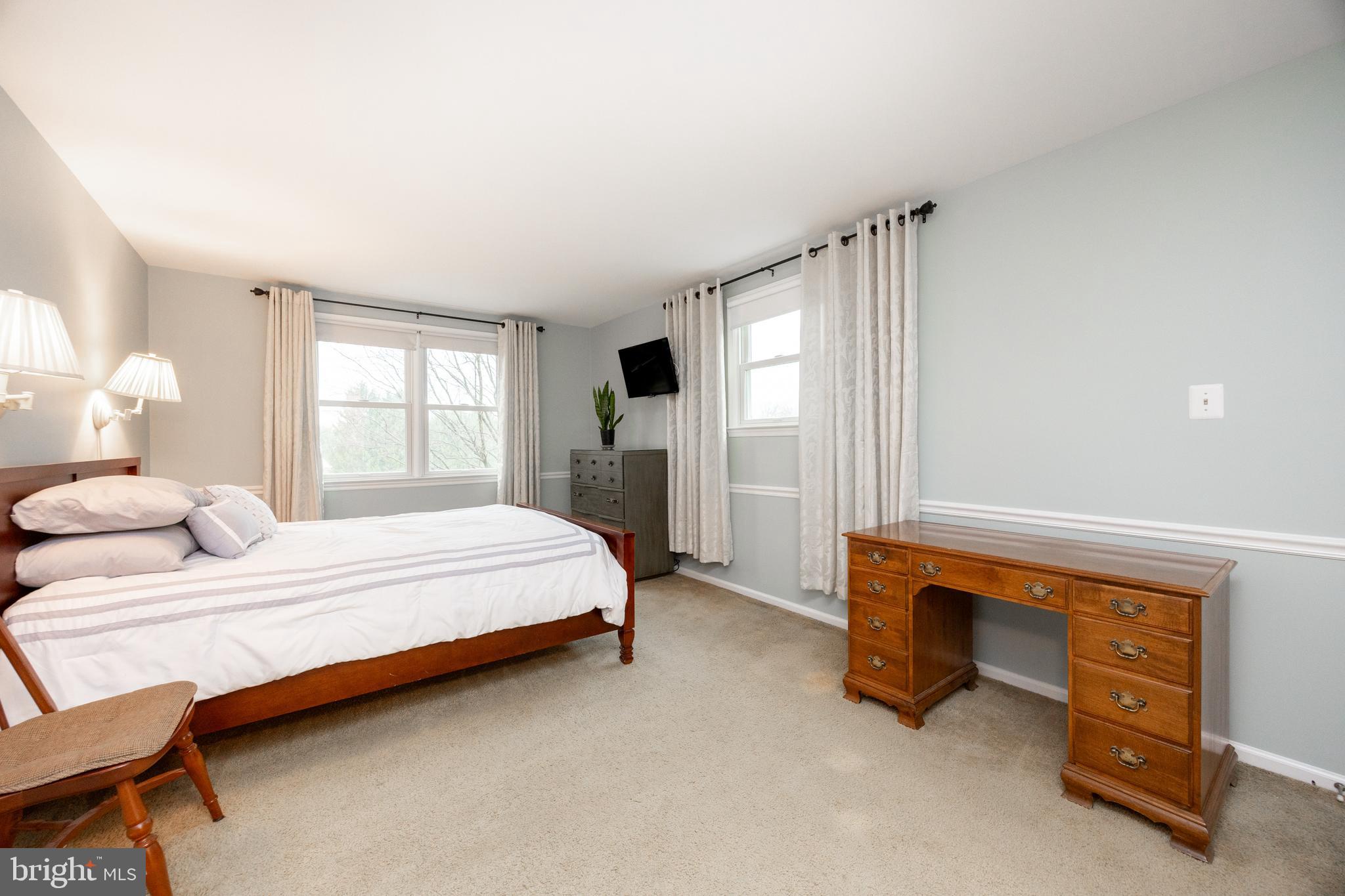 103 Stephen Drive Downingtown, PA 19335 - Photo 18 of 52 a bedroom with a bed and a window