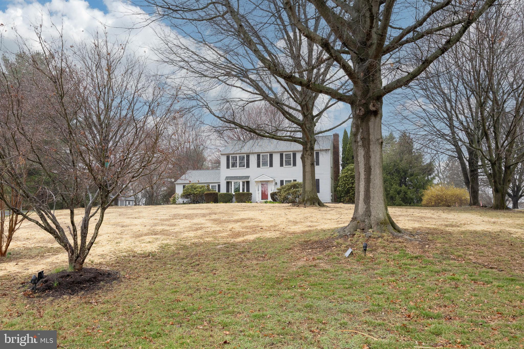 103 Stephen Drive Downingtown, PA 19335 - Photo 2 of 52 a house with trees in front of it