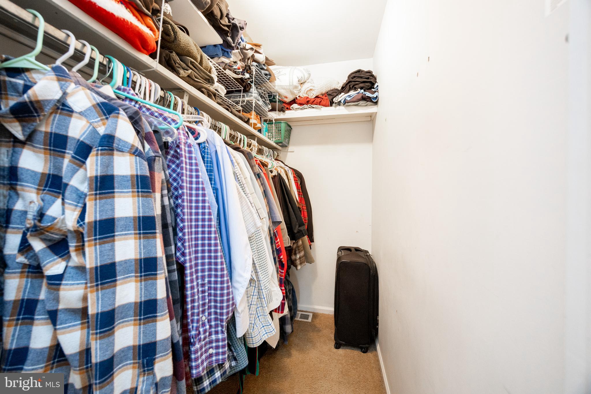 103 Stephen Drive Downingtown, PA 19335 - Photo 21 of 52 a view of walk in closet with clothes and shoes