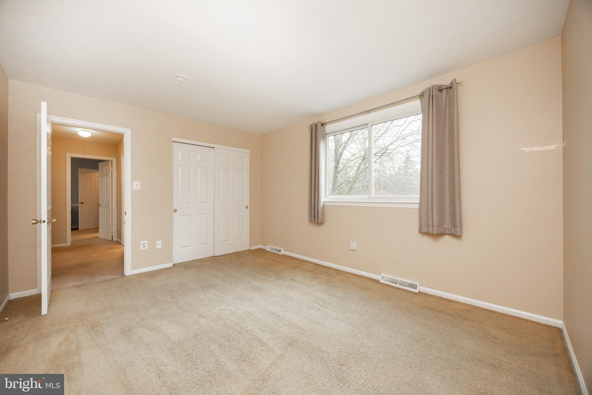 103 Stephen Drive Downingtown, PA 19335 - Photo 27 of 52 an empty room with windows