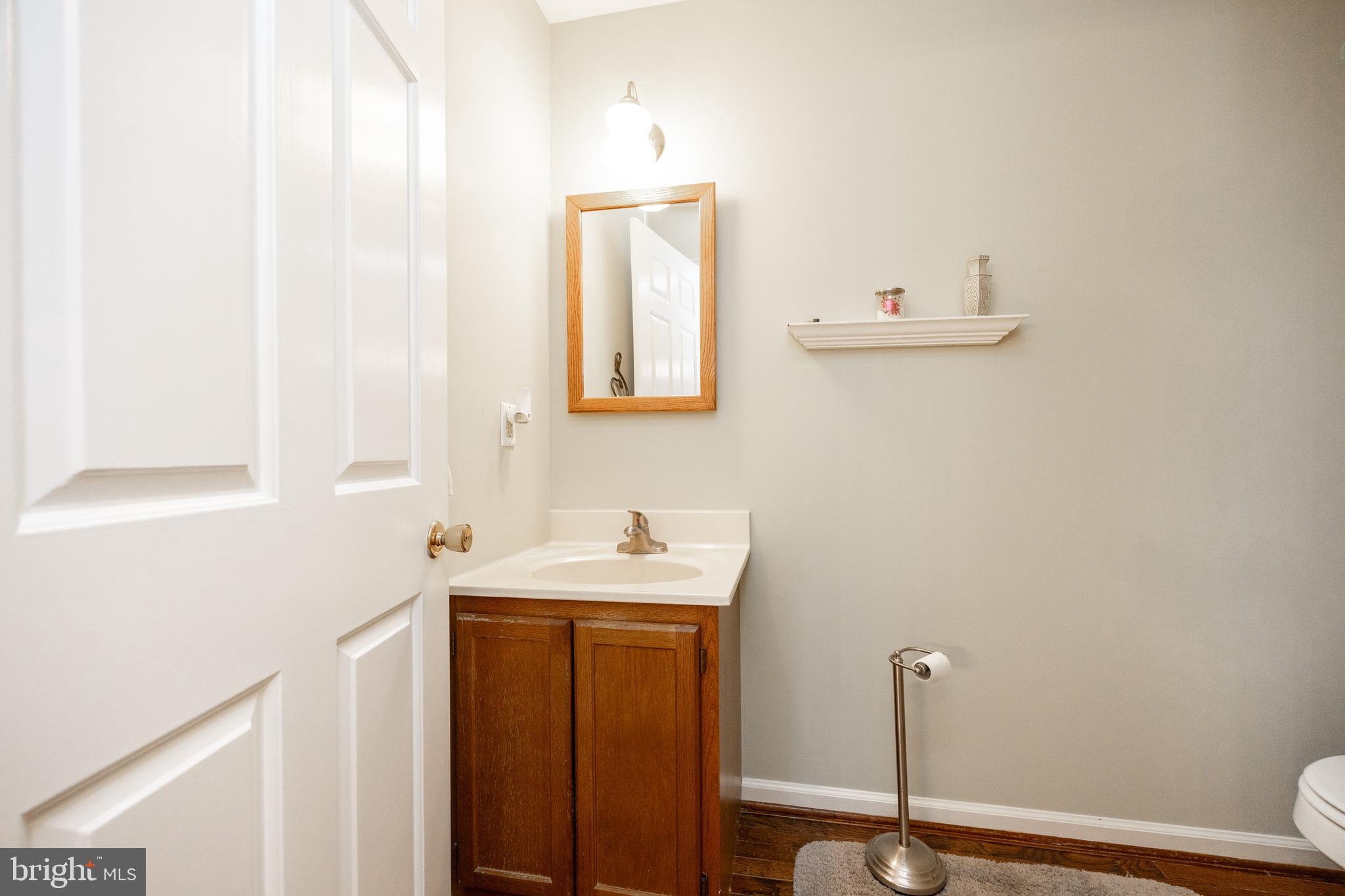 103 Stephen Drive Downingtown, PA 19335 - Photo 32 of 52 a bathroom with a sink and a mirror