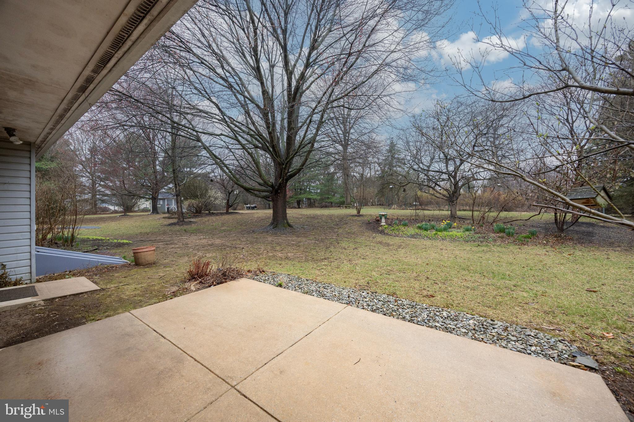 103 Stephen Drive Downingtown, PA 19335 - Photo 36 of 52 a backyard of a house with lots of green space