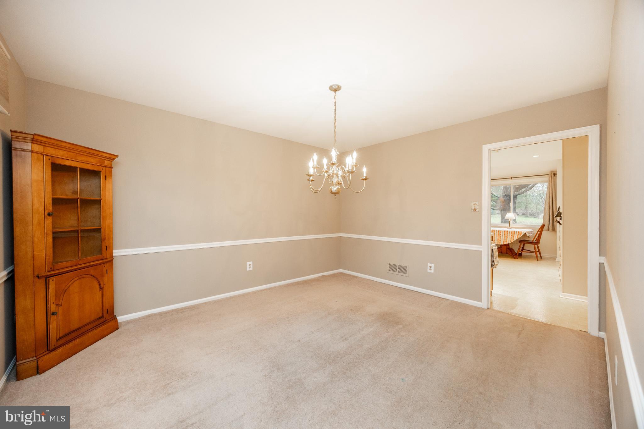 103 Stephen Drive Downingtown, PA 19335 - Photo 6 of 52 a view of a livingroom with a chandelier fan