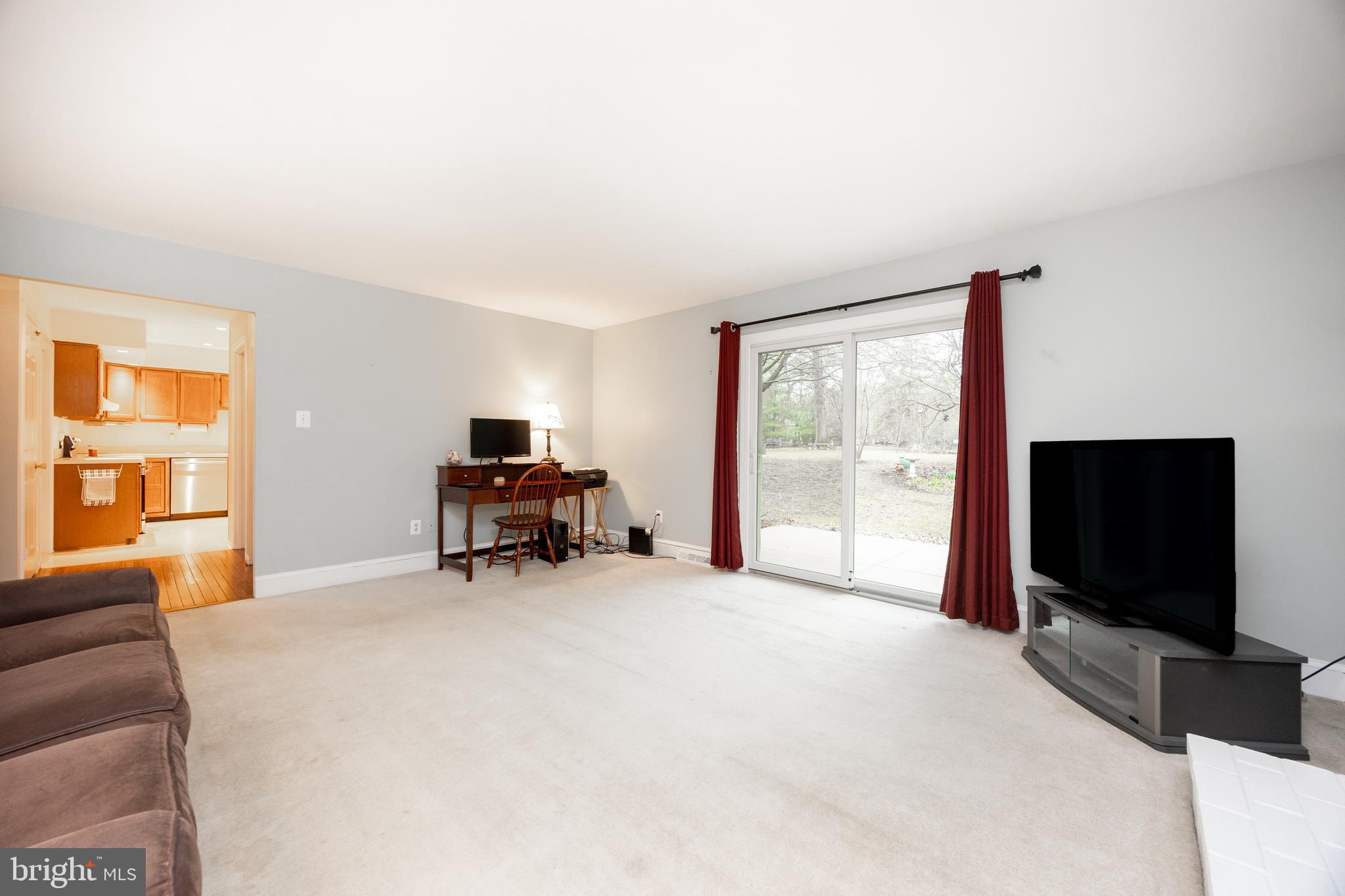 103 Stephen Drive Downingtown, PA 19335 - Photo 10 of 52 a living room with furniture and a flat screen tv