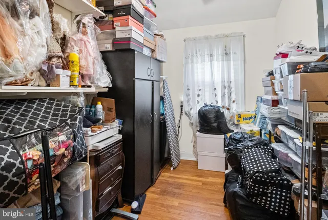 a kitchen with stainless steel appliances kitchen island granite countertop a refrigerator and a stove