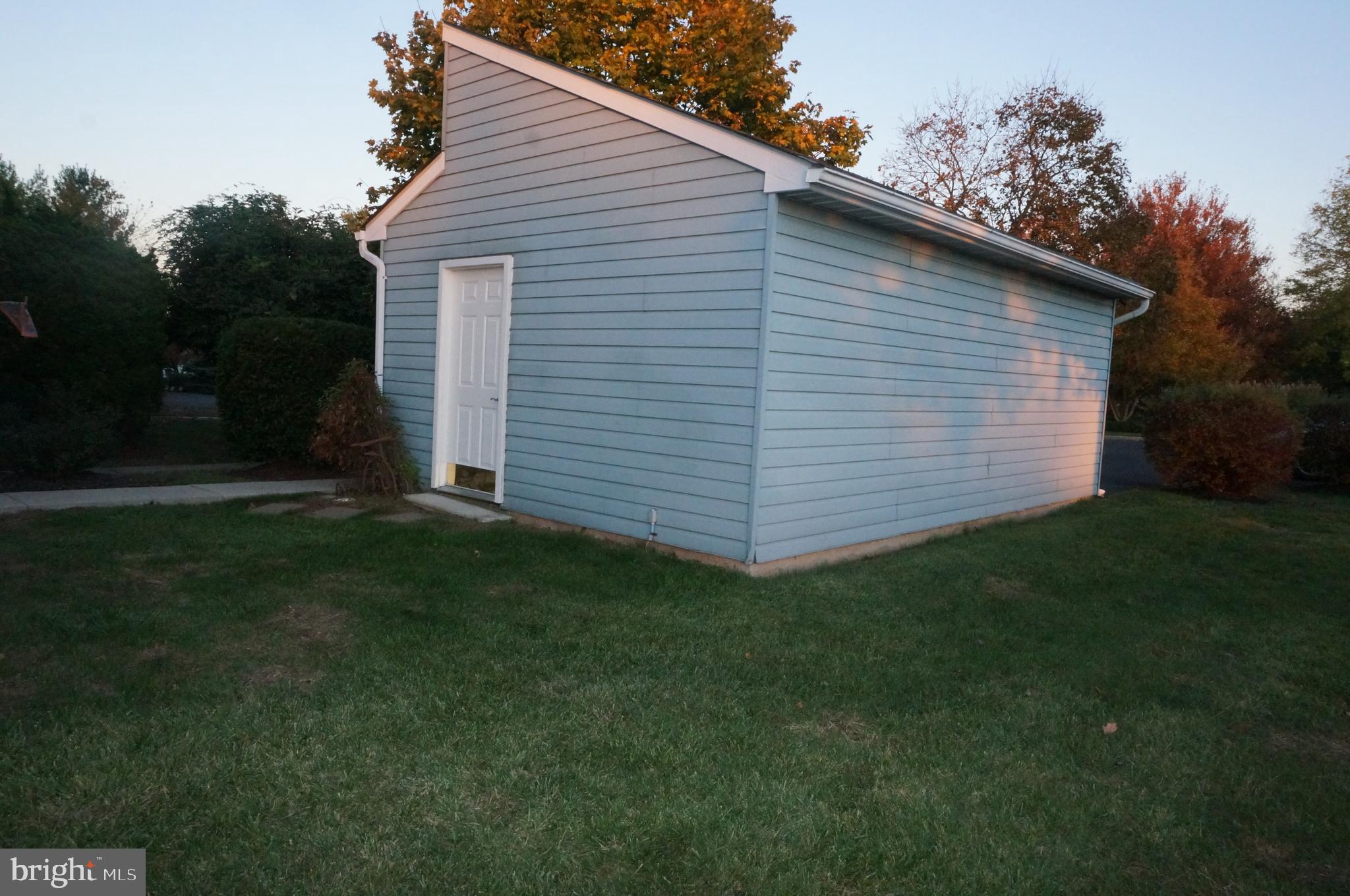 100 Tartan Terrace Chalfont, PA 18914 - Photo 6 of 37 Rear Entrance to Garage