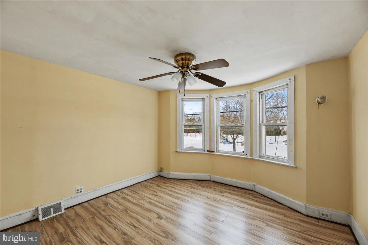 1267 Nottingham Way Hamilton, NJ 08609 - Photo 12 of 24 a view of an empty room with a window