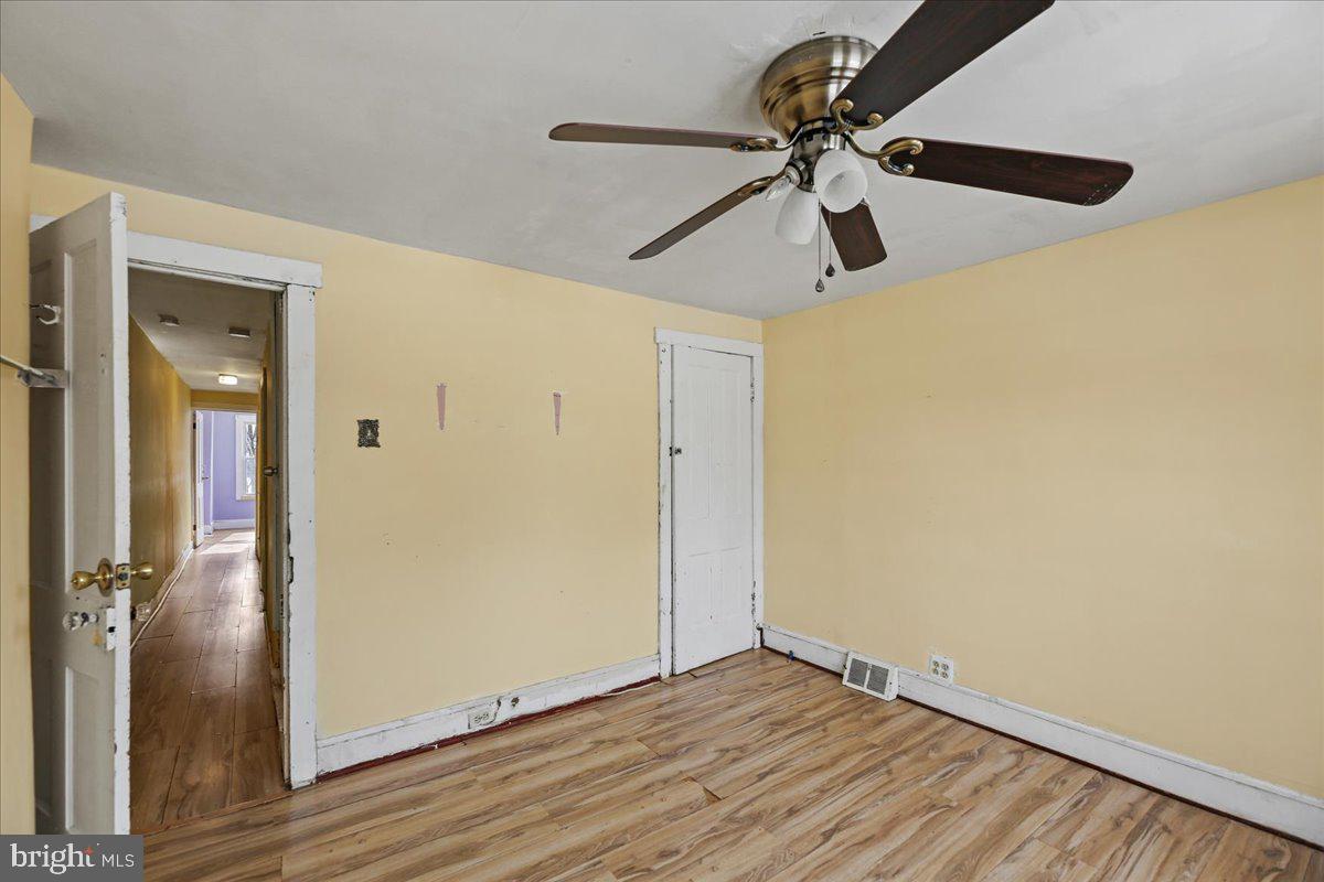 1267 Nottingham Way Hamilton, NJ 08609 - Photo 13 of 24 a view of an empty room with wooden floor
