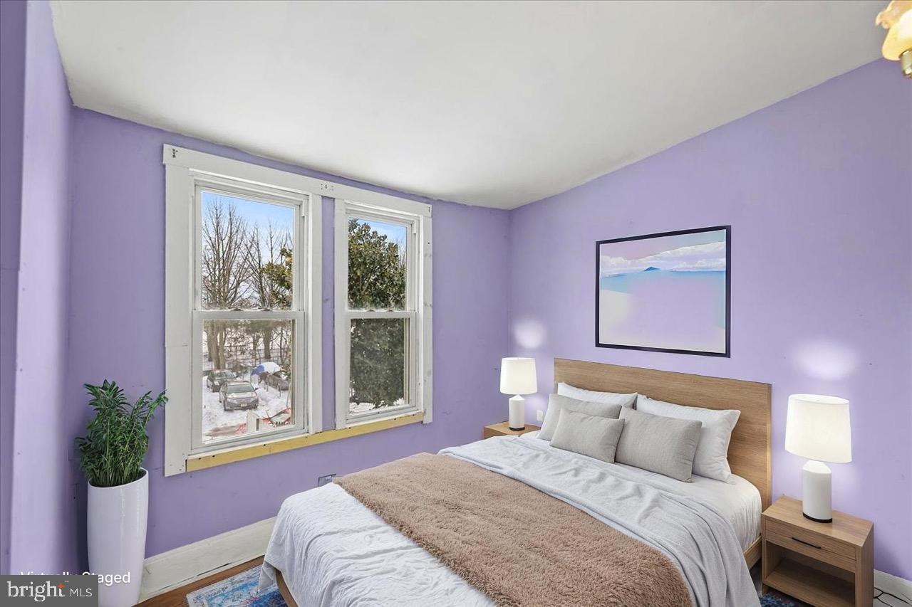 1267 Nottingham Way Hamilton, NJ 08609 - Photo 14 of 24 a bedroom with a bed and a window