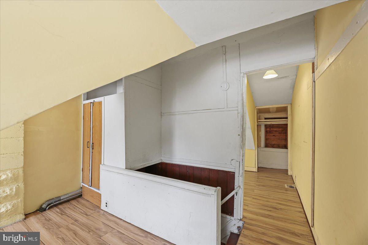 1267 Nottingham Way Hamilton, NJ 08609 - Photo 20 of 24 a view of a hallway with wooden floor