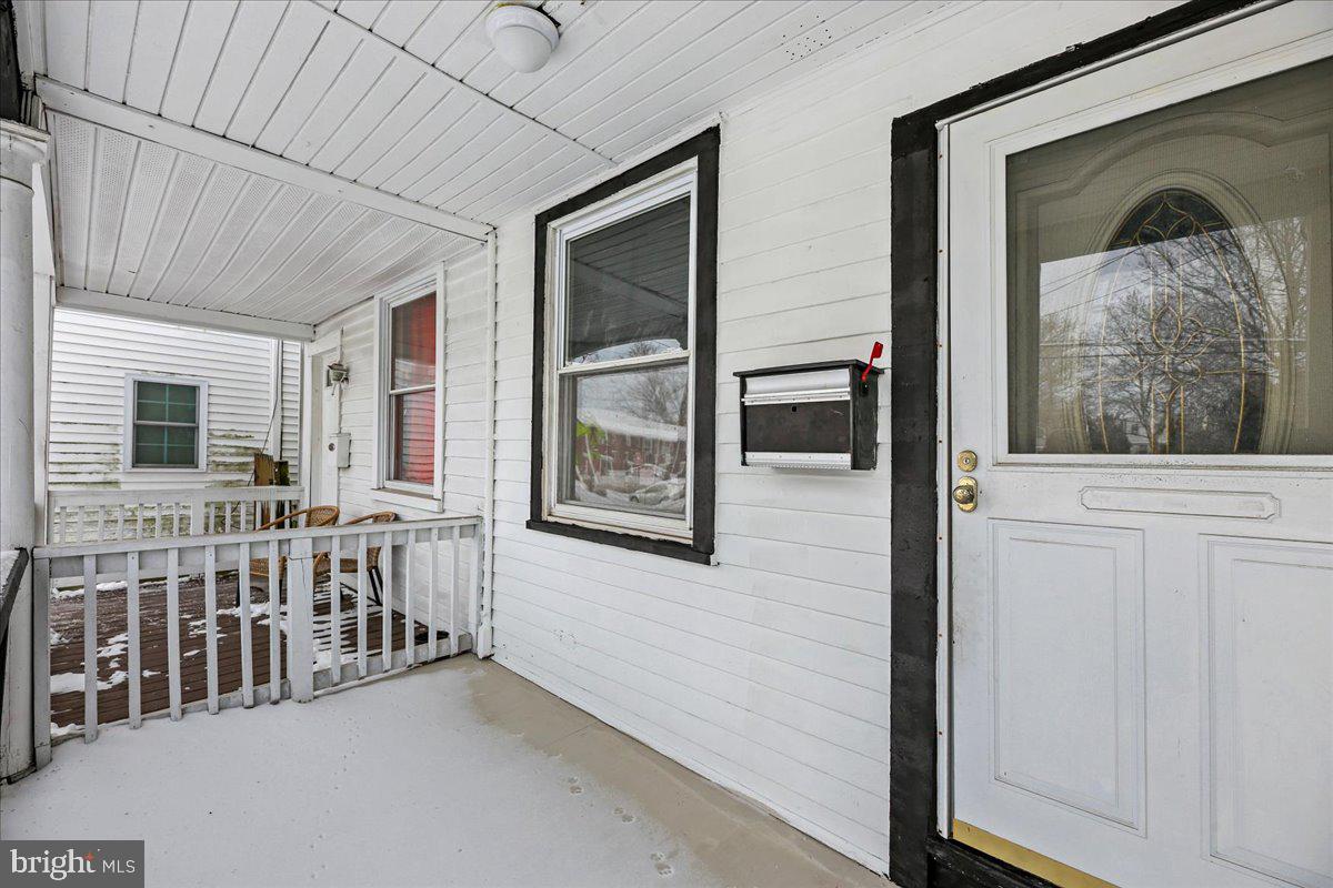1267 Nottingham Way Hamilton, NJ 08609 - Photo 2 of 24 a view of a hallway with windows