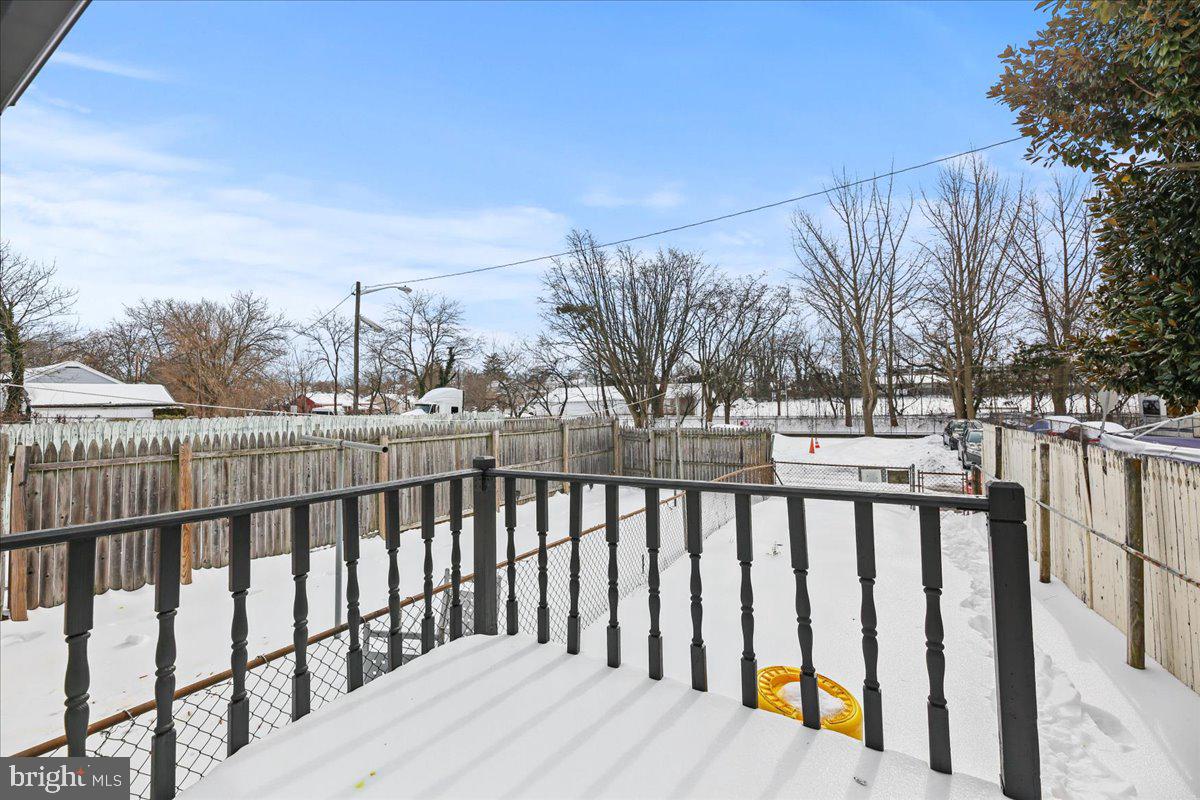 1267 Nottingham Way Hamilton, NJ 08609 - Photo 23 of 24 a view of a wooden street from a balcony