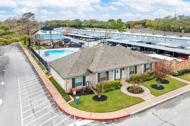 swimming pool view with a outdoor seating space