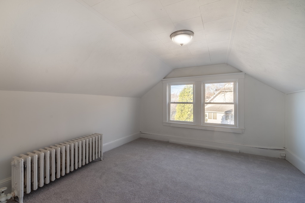 72 Pond Street Ashland, MA 01721 - Photo 23 of 33 an empty room with a window