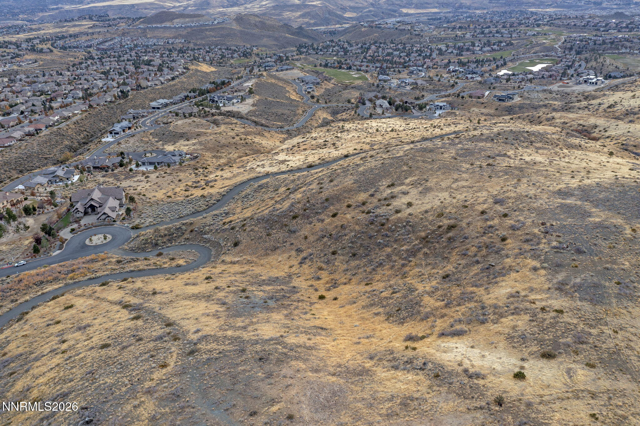 0 Painted River Trail Reno, NV 89523 - Photo 17 of 18 a view of a dry yard with wooden fence