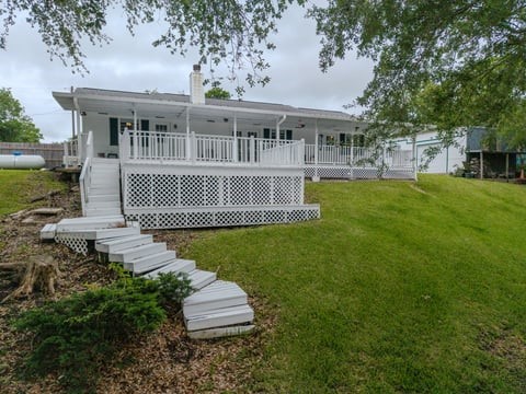 483 Riverside Drive Palacios, TX 77465 - Photo 39 of 41 a view of house with a yard