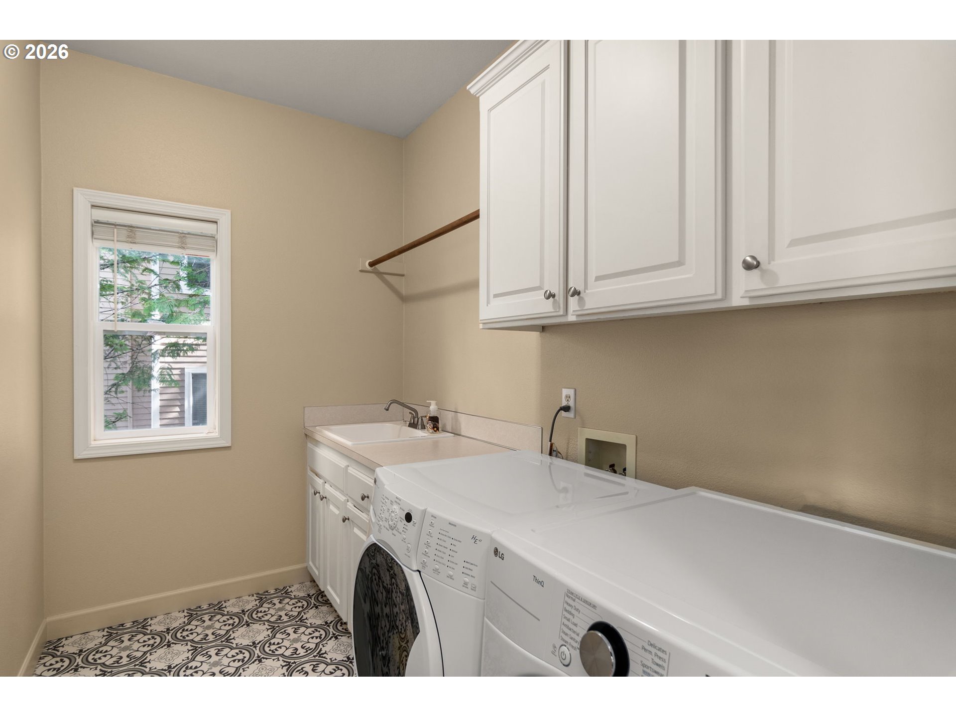 9625 Northwest Fleischner Street Portland, OR 97229 - Photo 20 of 39 a utility room with dryer and washer