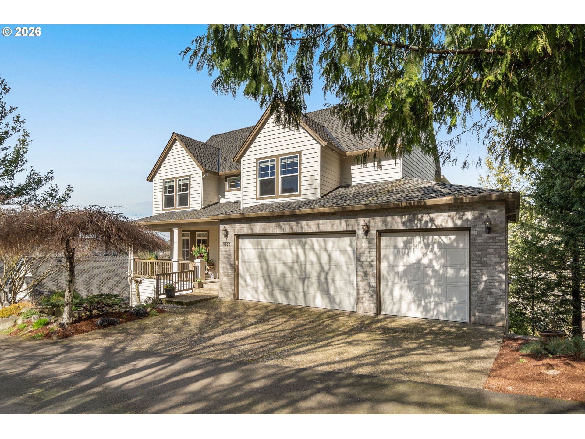 9625 Northwest Fleischner Street Portland, OR 97229 - Photo 2 of 39 a house view with a garden space