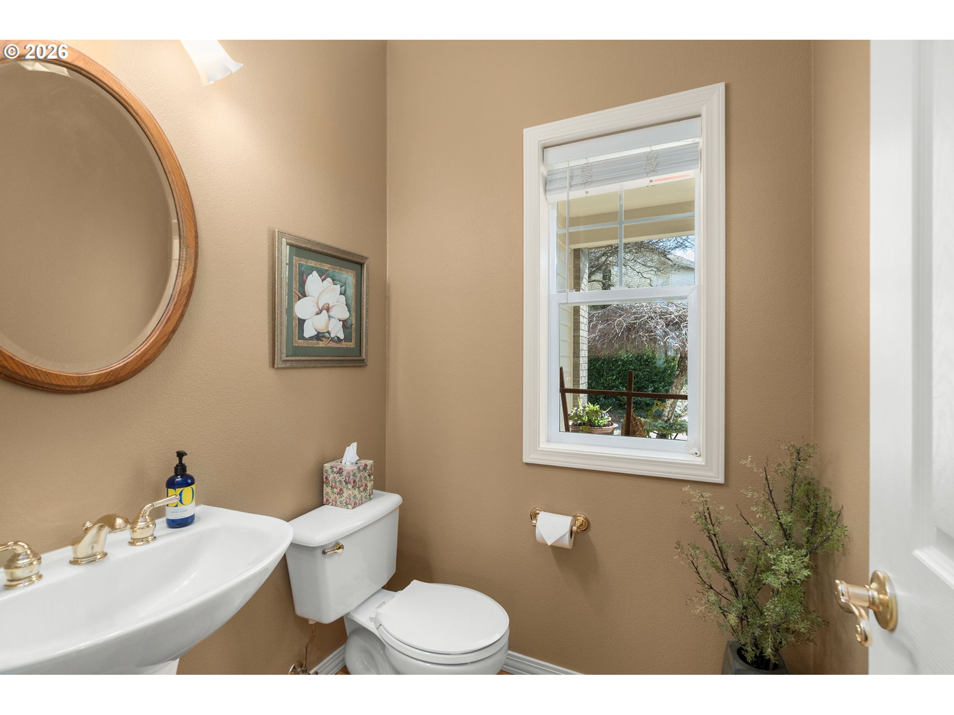 9625 Northwest Fleischner Street Portland, OR 97229 - Photo 21 of 39 a bathroom with a toilet a sink and a mirror