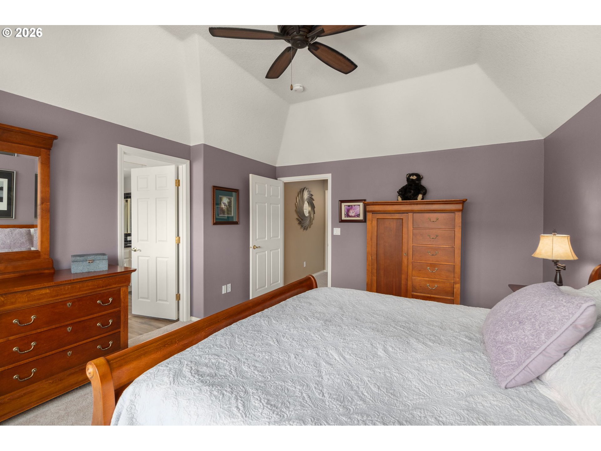 9625 Northwest Fleischner Street Portland, OR 97229 - Photo 27 of 39 a bedroom with a bed and a dresser