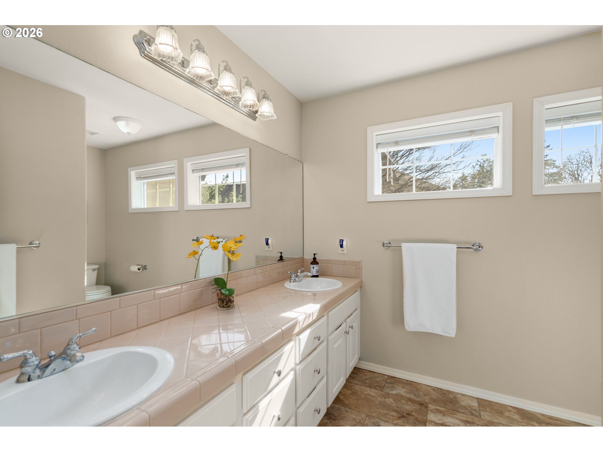9625 Northwest Fleischner Street Portland, OR 97229 - Photo 35 of 39 a bathroom with a sink and a mirror