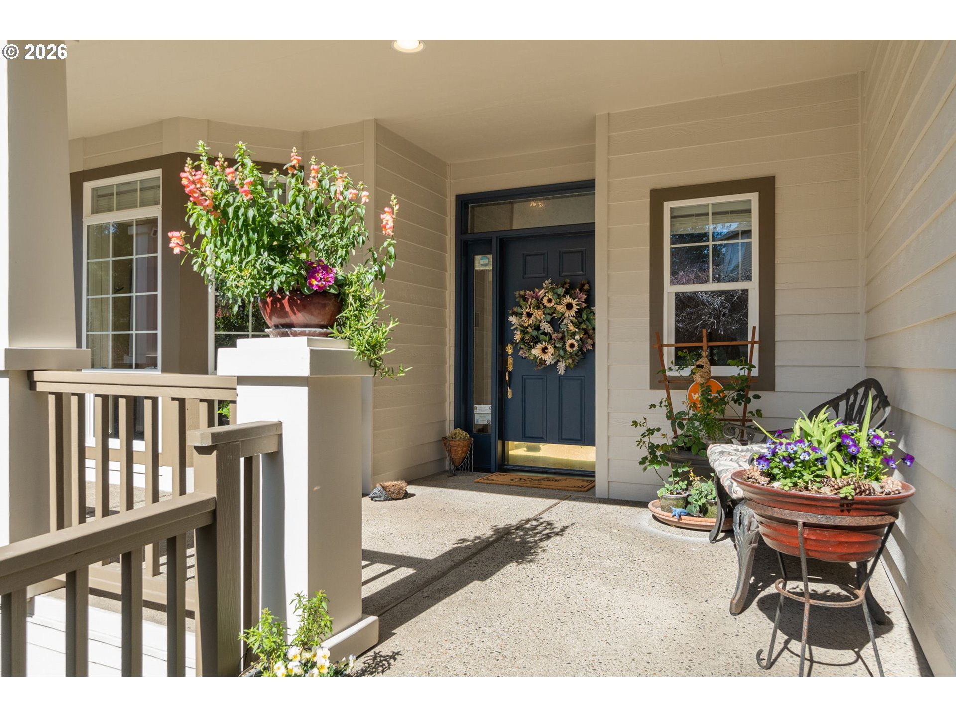 9625 Northwest Fleischner Street Portland, OR 97229 - Photo 5 of 39 a view of a house with a porch and furniture