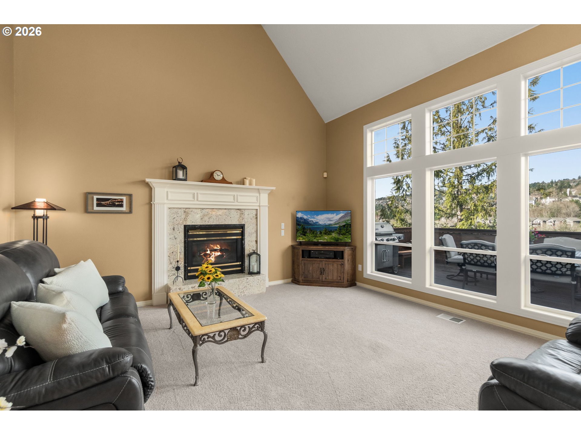 9625 Northwest Fleischner Street Portland, OR 97229 - Photo 9 of 39 a living room with furniture and a fireplace