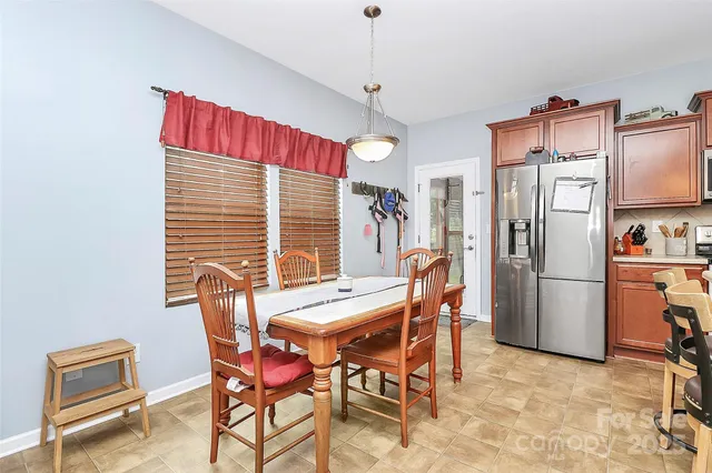 a bathroom with a sink toilet and a mirror