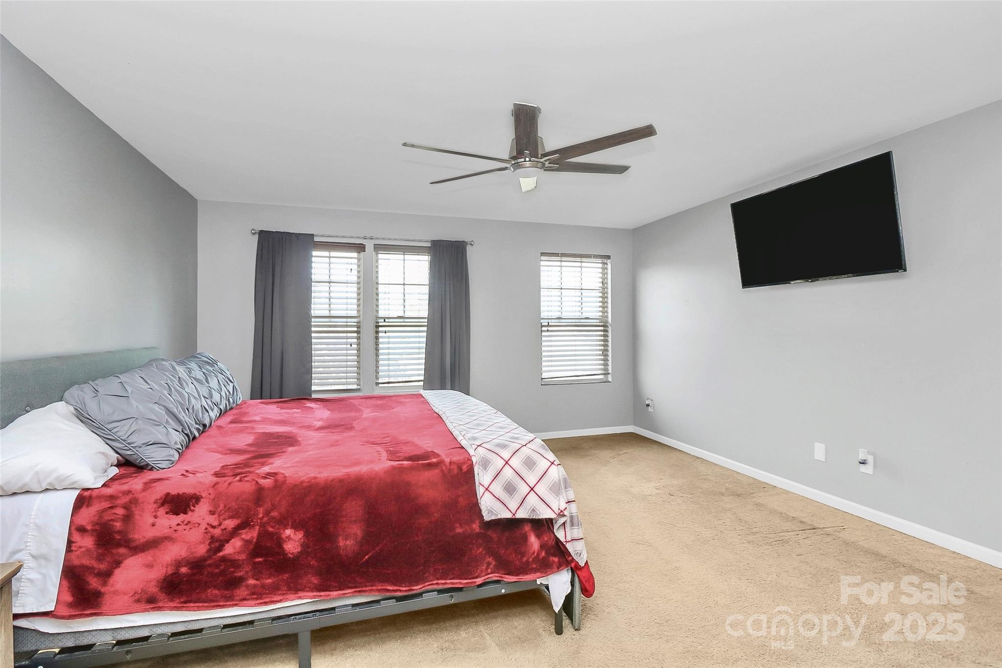 1288 Century Drive Clover, SC 29710 - Photo 19 of 43 a bedroom with a bed and a flat screen tv