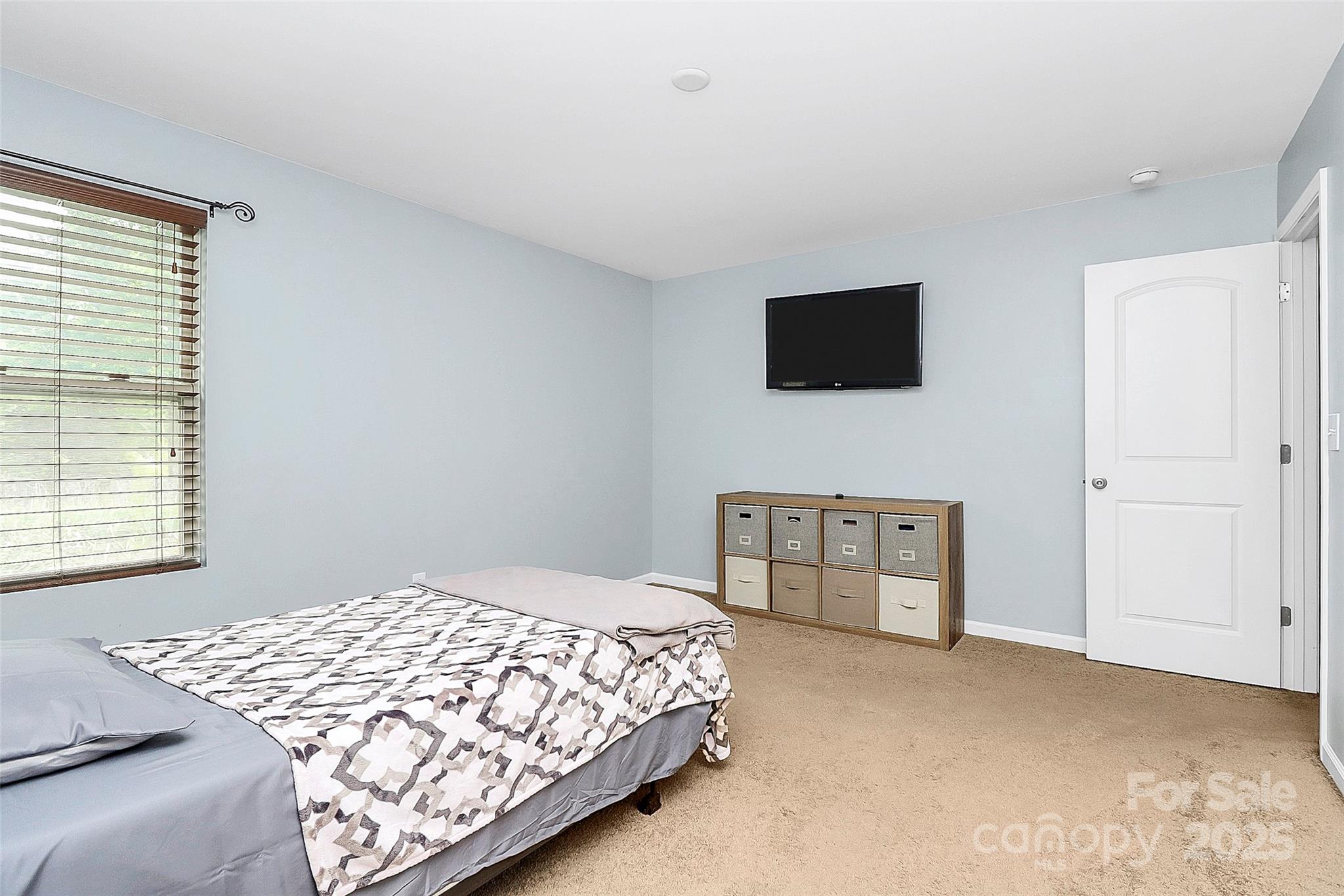 1288 Century Drive Clover, SC 29710 - Photo 26 of 43 a bedroom with a bed and a television