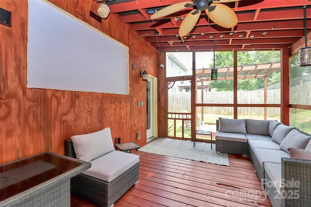 a kitchen with stainless steel appliances granite countertop a stove a sink and a wooden floors