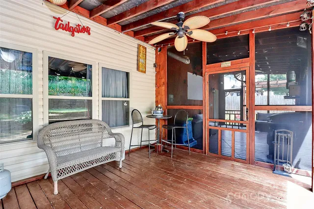 a view of a outdoor kitchen with a large window