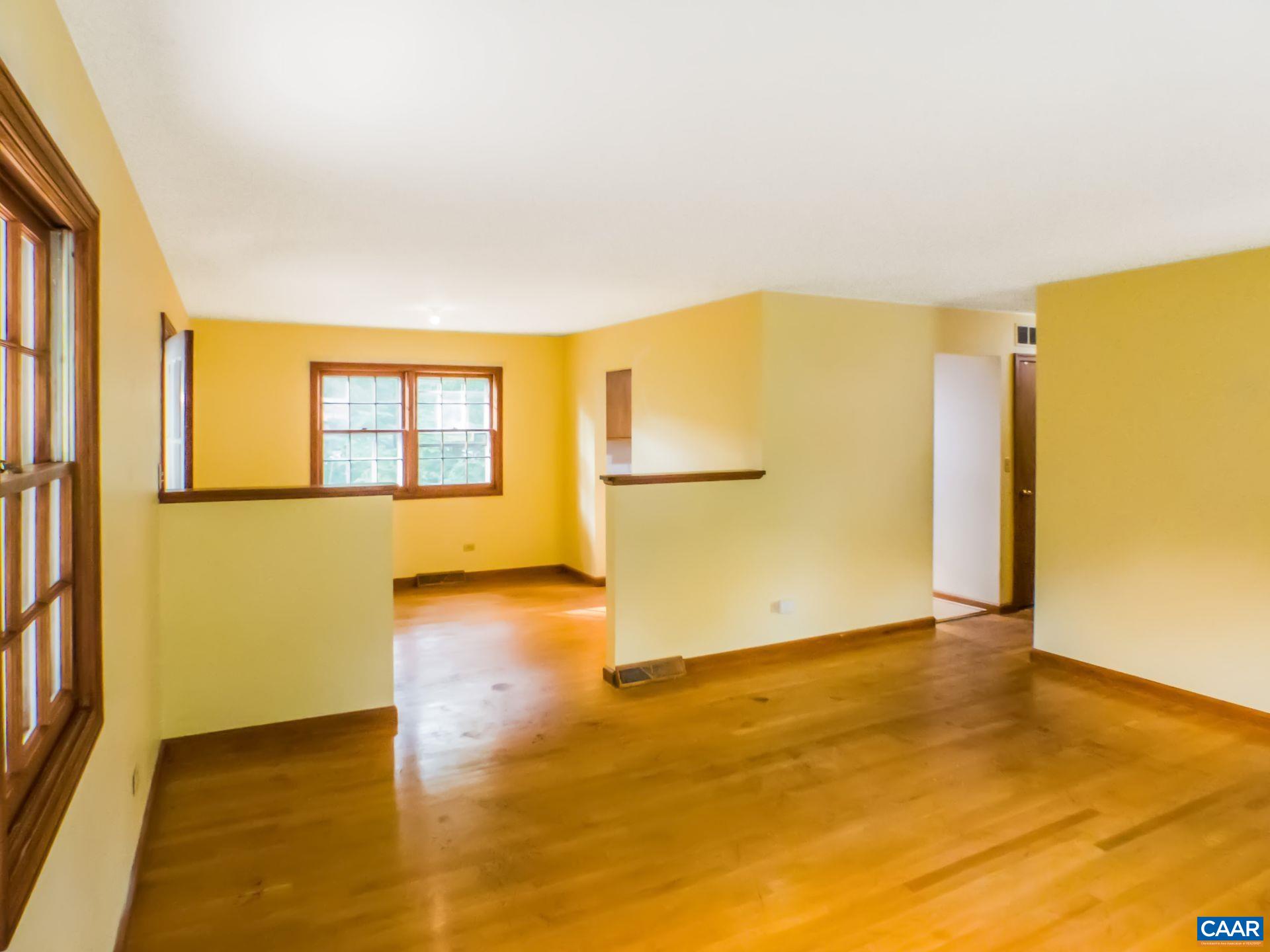 1533 Trailridge Road Charlottesville, VA 22903 - Photo 11 of 35 a view of a room with wooden floor and a window