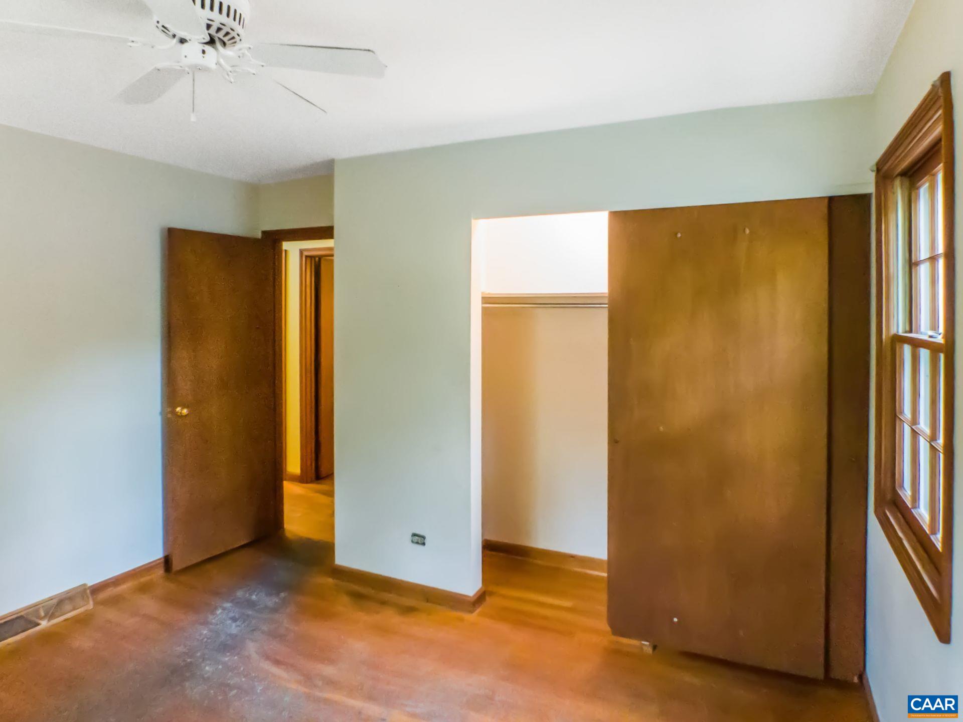 1533 Trailridge Road Charlottesville, VA 22903 - Photo 17 of 35 wooden floor in an empty room with a window