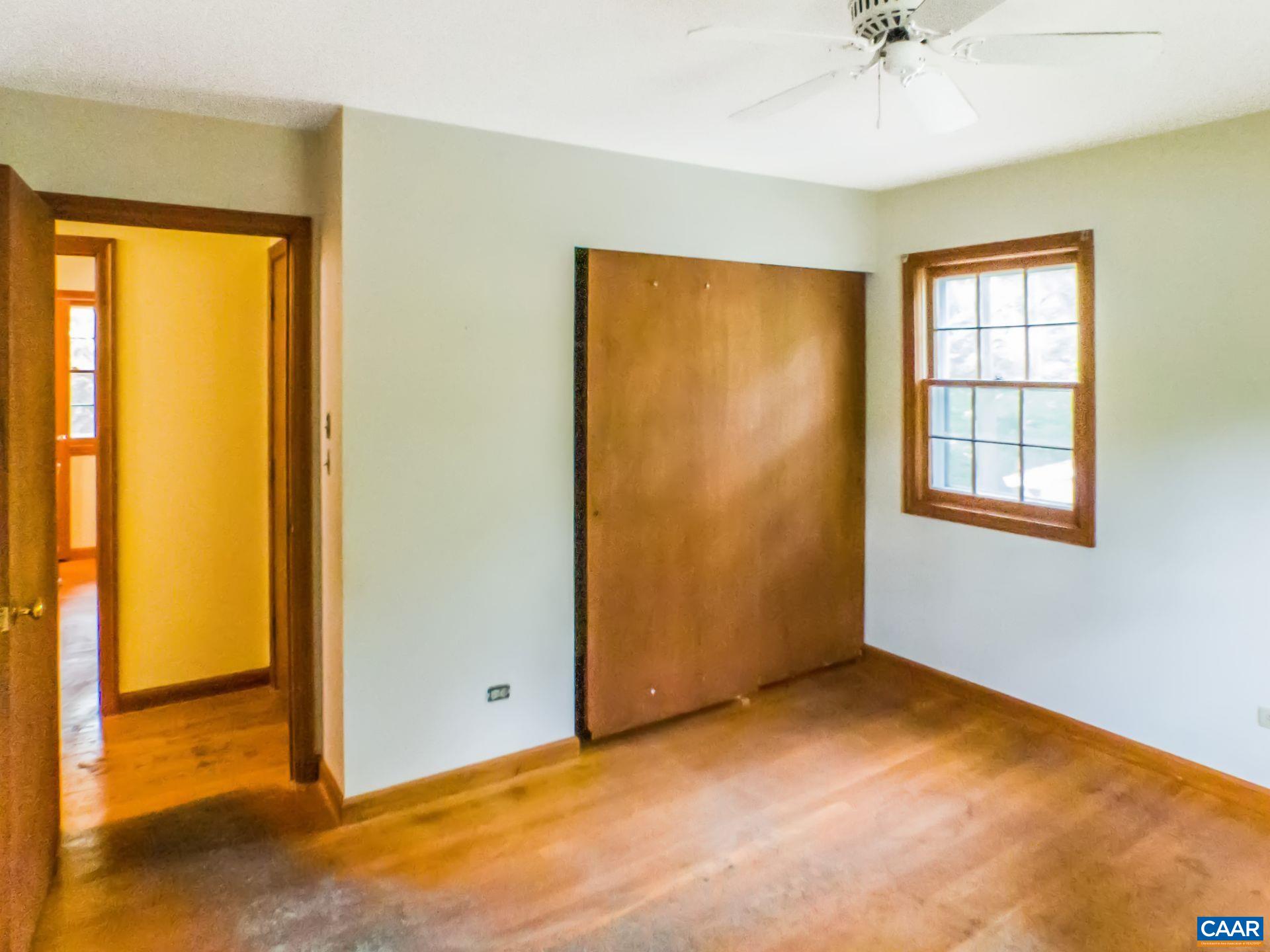 1533 Trailridge Road Charlottesville, VA 22903 - Photo 18 of 35 a view of an empty room with a window
