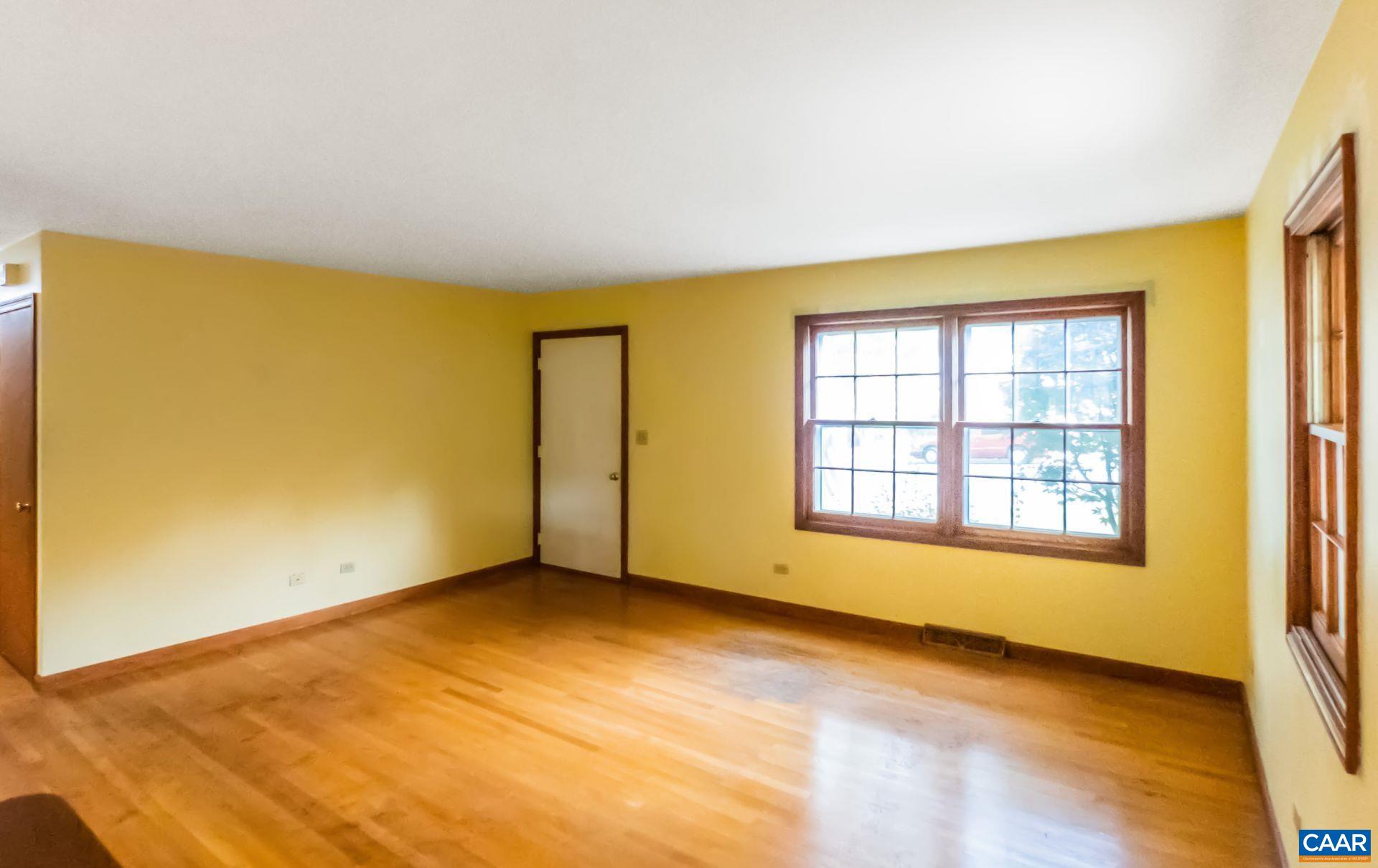 1533 Trailridge Road Charlottesville, VA 22903 - Photo 5 of 35 wooden floor in an empty room with a window