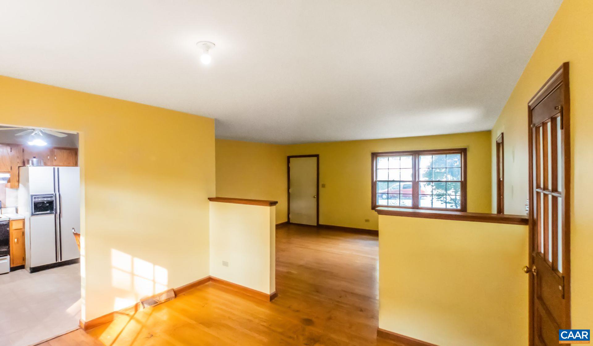 1533 Trailridge Road Charlottesville, VA 22903 - Photo 7 of 35 a view of an empty room with a window
