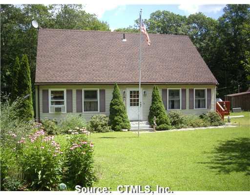 140 Fire Tower Road Eastford, CT 06259 - Photo 1 of 1 a front view of a house with a yard and outdoor seating