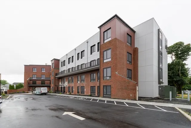a view of a building with a street